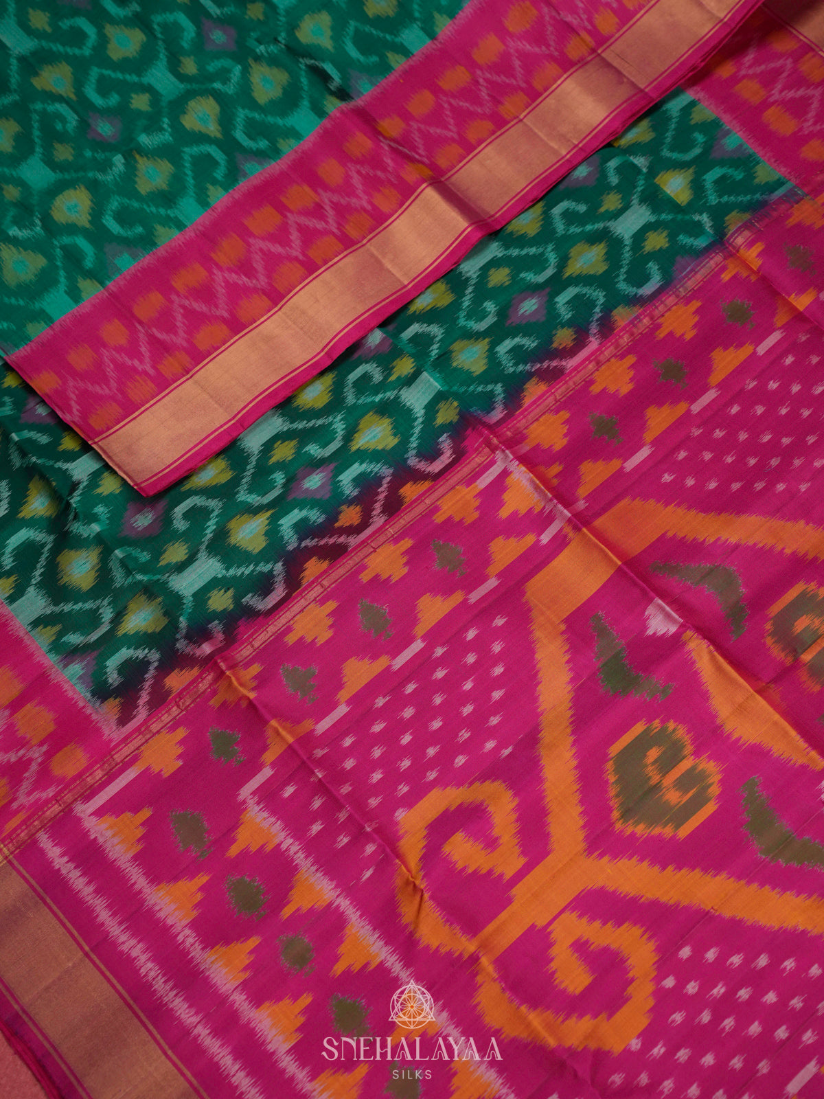 Teal Green Ikat Soft Silk Saree