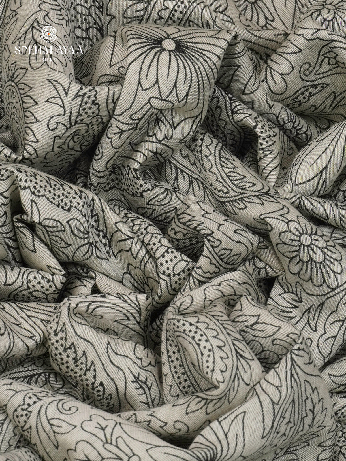 Off-White Kalamkari Saree with Dark Green Woven Border