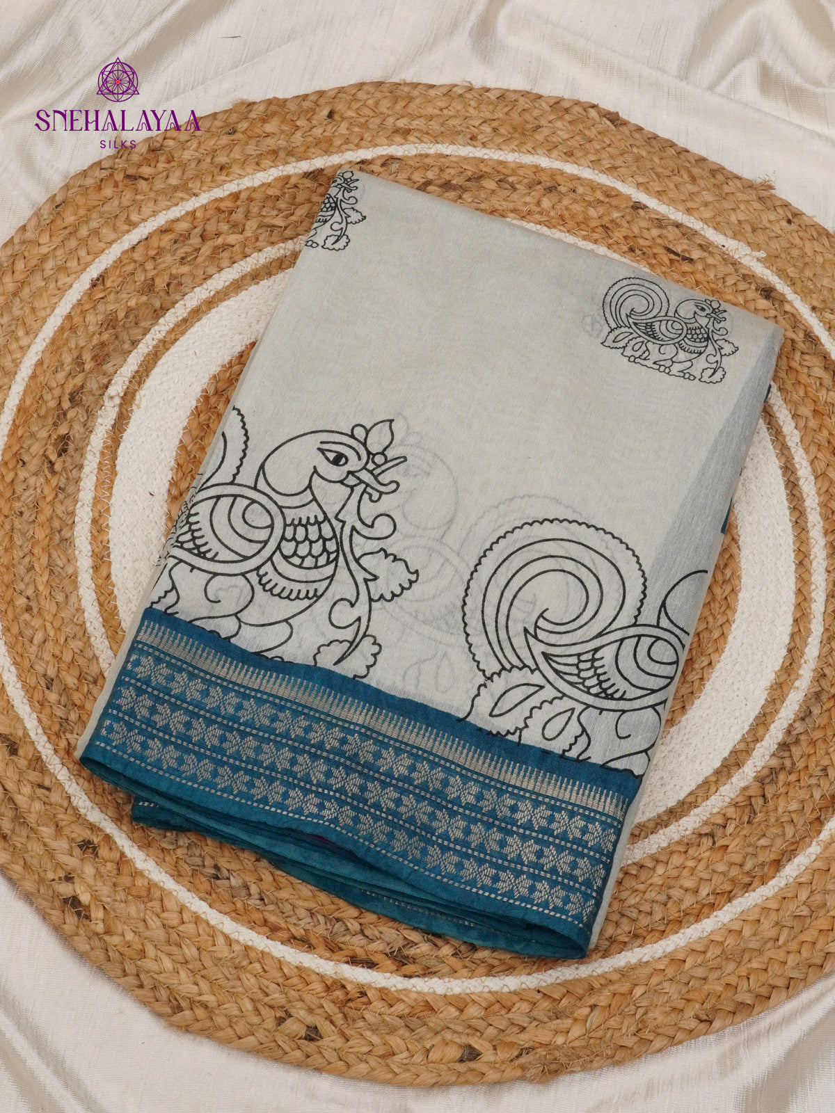 Off White Kalamkari Saree with Teal Blue Woven Border