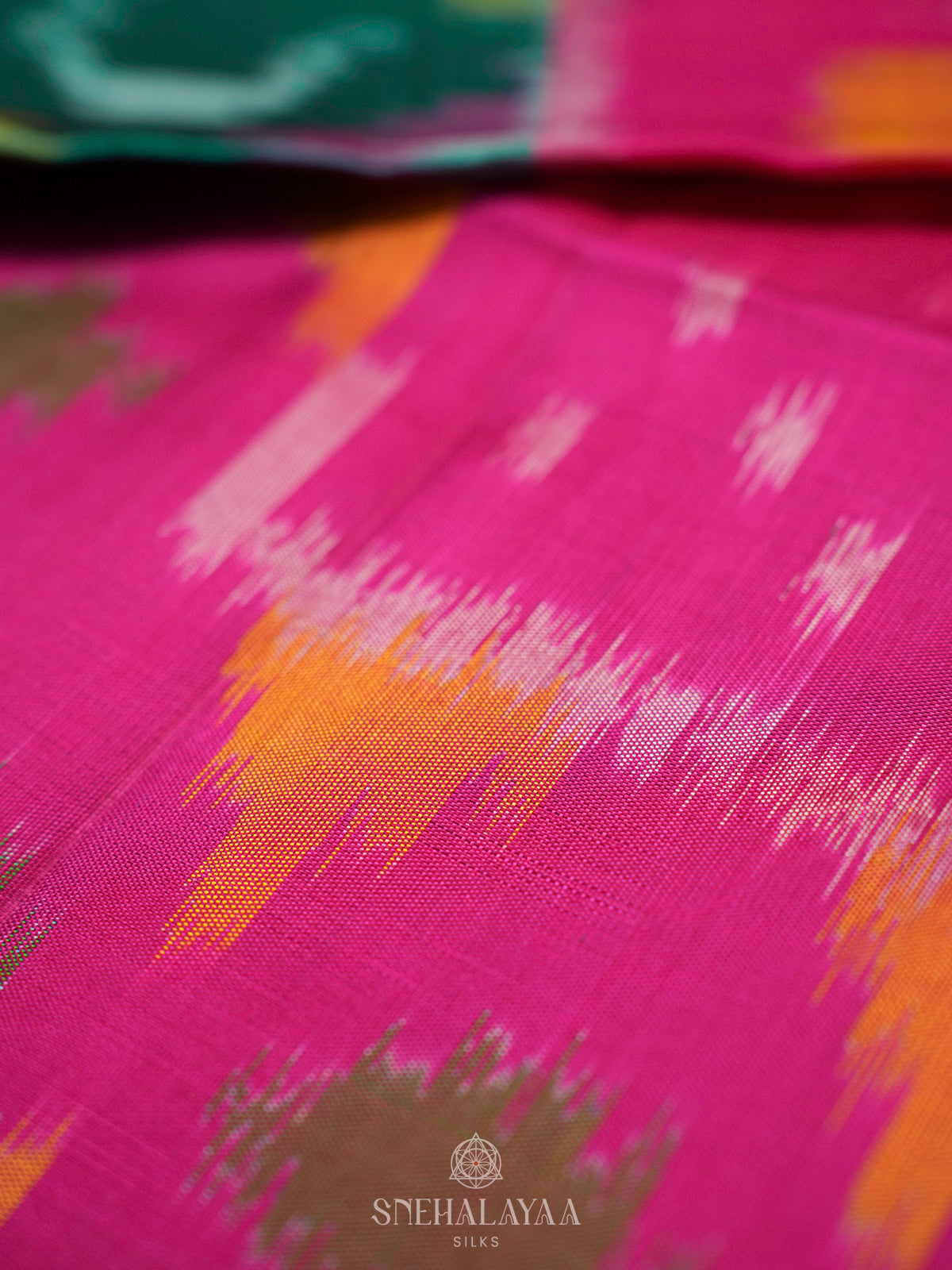 Teal Green Ikat Soft Silk Saree