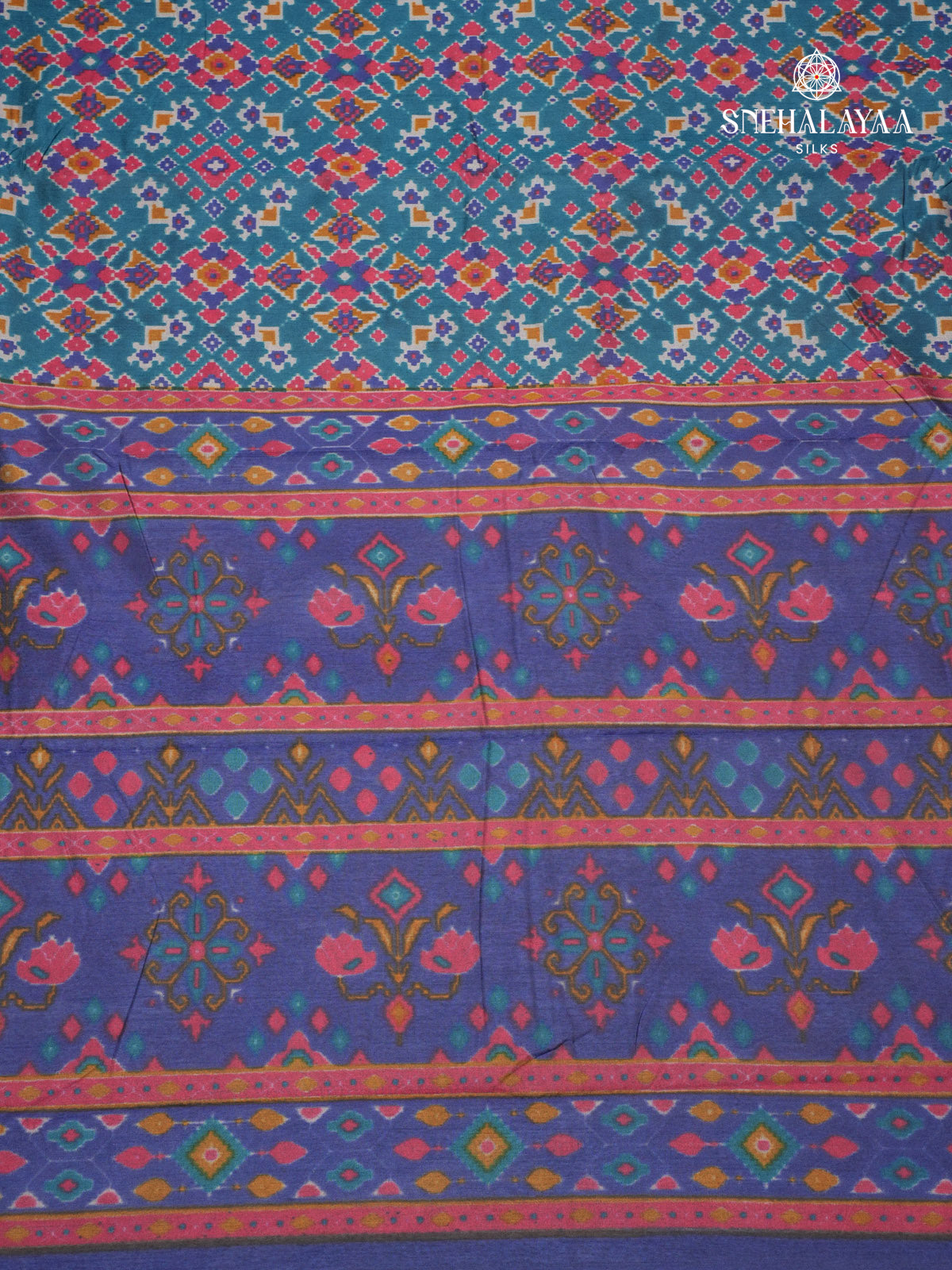 Teal Blue Ikat Saree