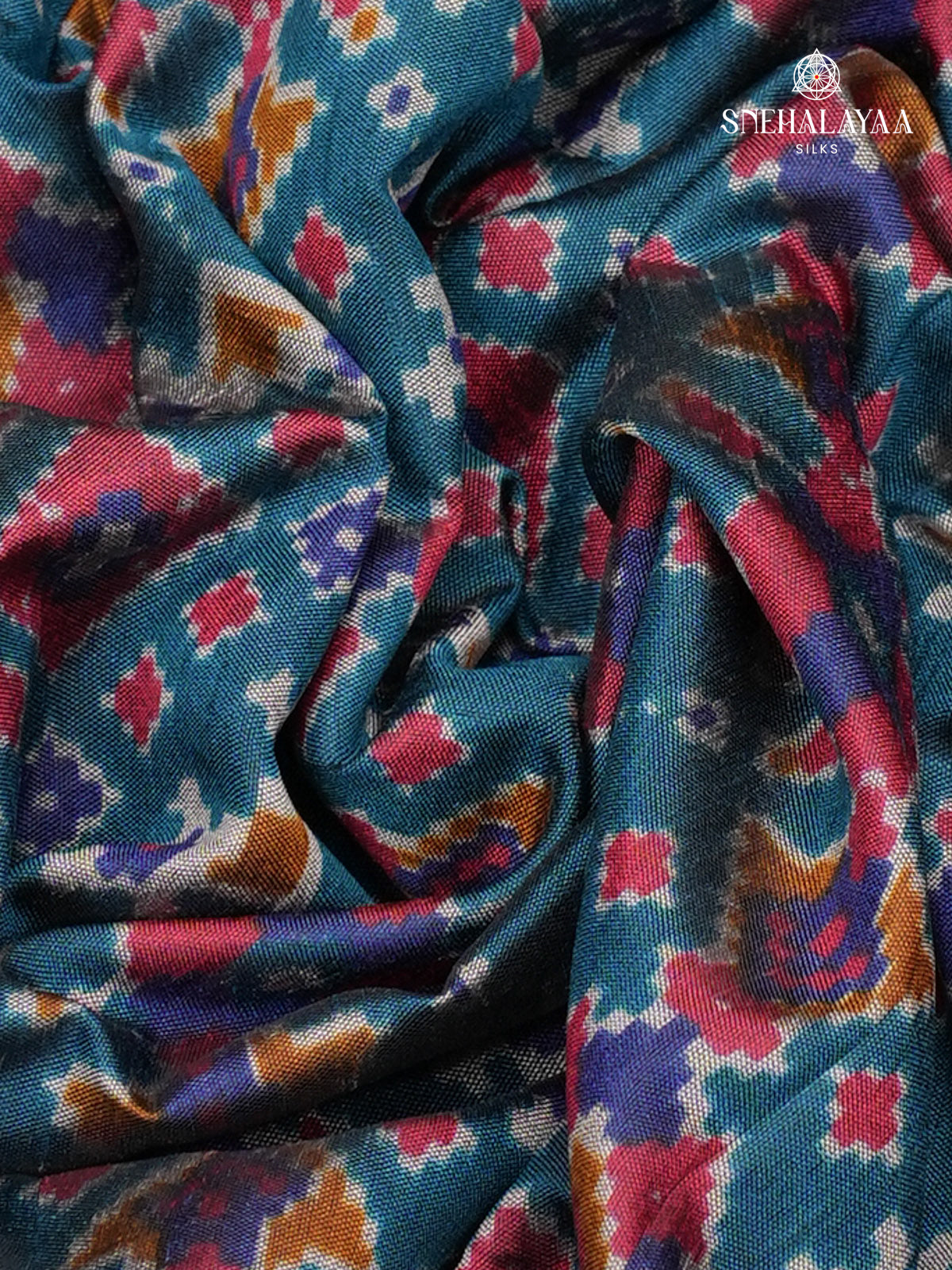 Teal Blue Ikat Saree